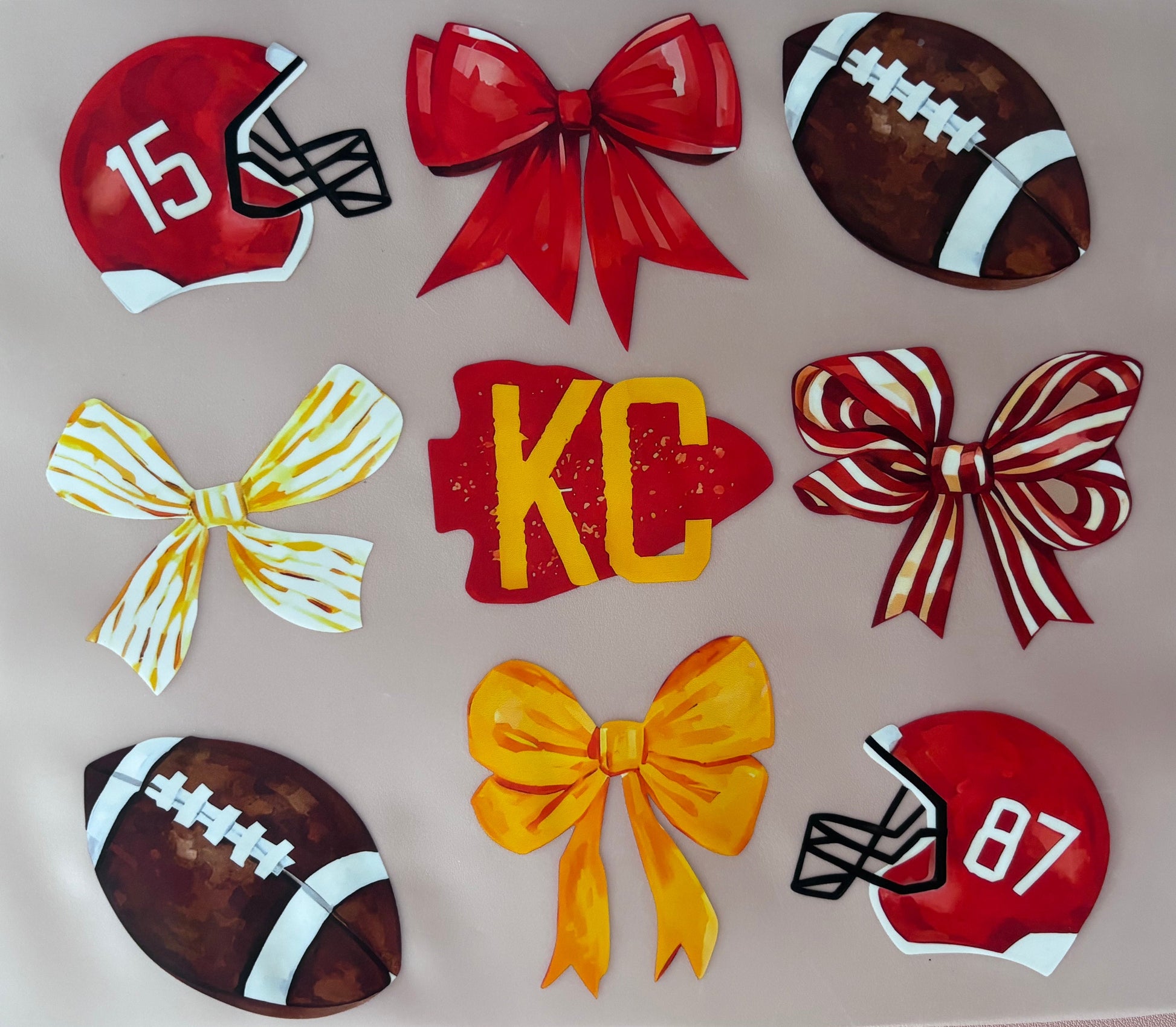 dtf transfer with footballs, bows, and helmets on a pink background KC kansas city sports football tshirt tote