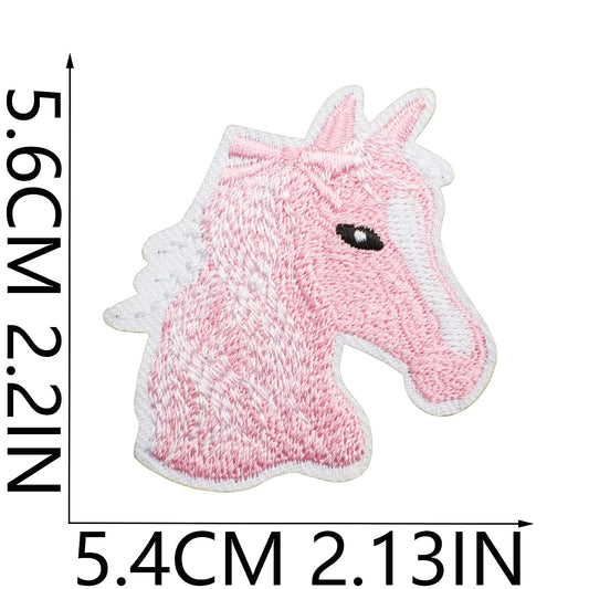 Pink unicorn patch with measurements on a white background hats and totes