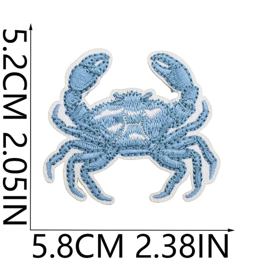 Blue crab patch with measurements on a white background western cowgirl coastal